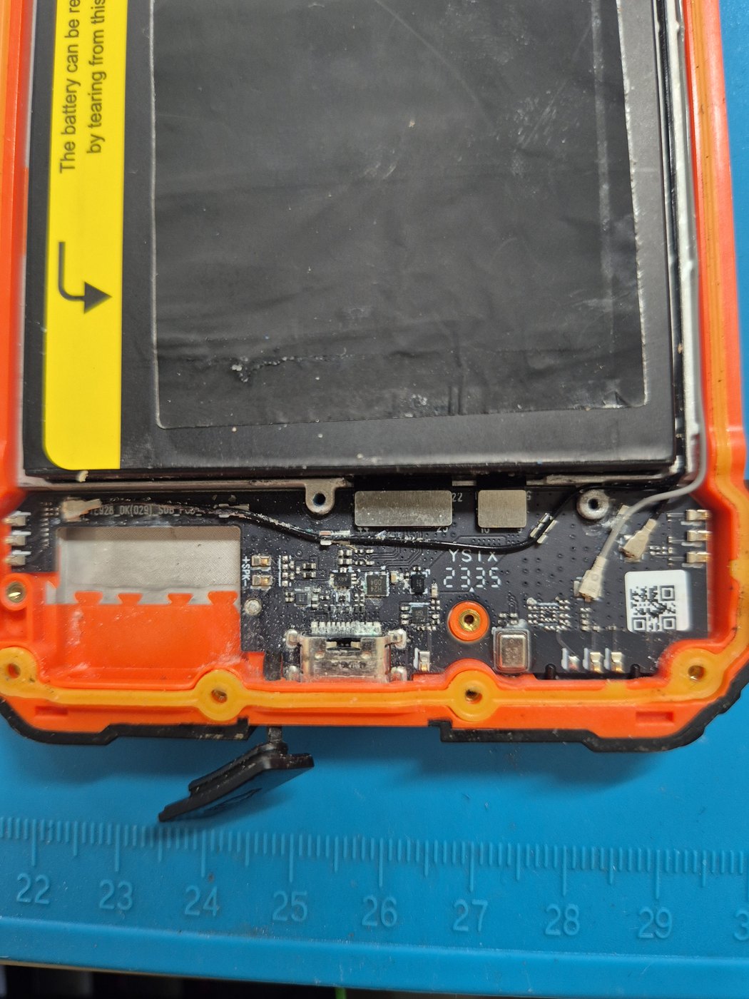Phone opened for charging-port and circuit-board diagnostics